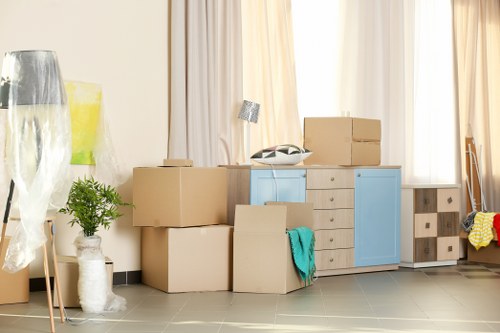 Office relocation planning in Sanderstead with business equipment and moving boxes