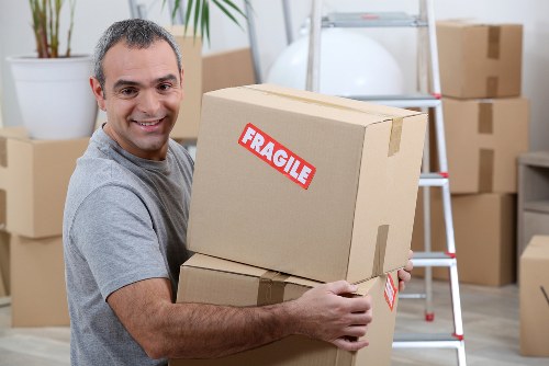 House movers loading furniture in a Sanderstead residential street