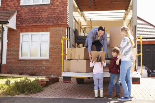 Removal team planning a home move in Sanderstead with boxes and furniture