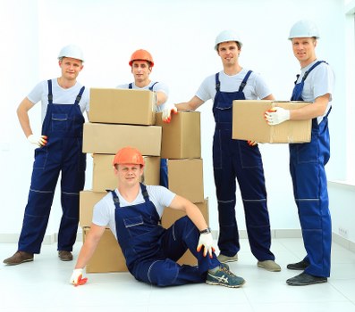 Loading furniture into a van for a Sanderstead home move