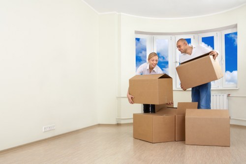 Packed household boxes ready for a local house removal service