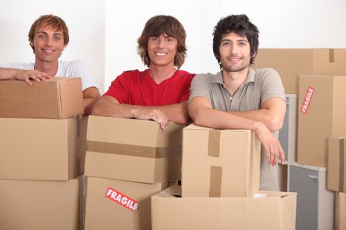 Team protecting floors and walls during a move