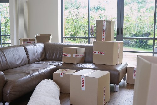 Local removal truck loading furniture and boxes in Sanderstead