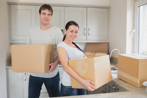 Loading household furniture into a removal van in Sanderstead